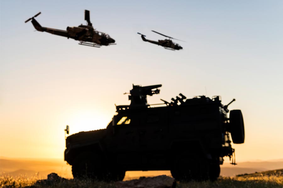 combat vehicle and helicopters
